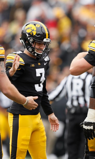 No. 23 Iowa holds off Purdue 26-20